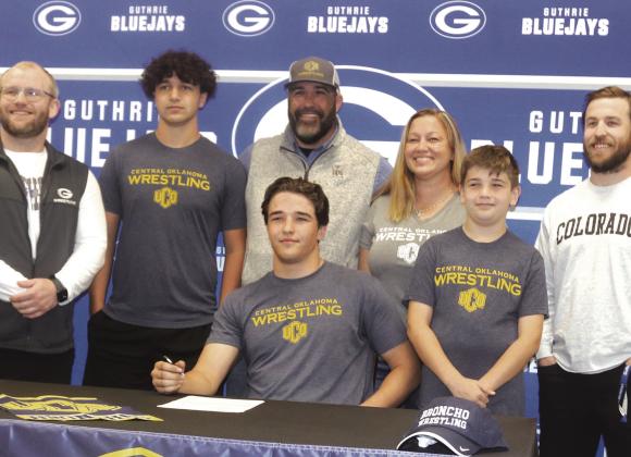 Guthrie senior Wesley Silvis signed a Letter of Intent on May 9 to wrestle at University of Central Oklahoma next year. Silvis will wrestle at 197 pounds for the Bronchos. Silvis finished 24-7 this past season and a fourth place finish at 190 pounds in the Class 5A State Tournament. Silvis plans to major in kinesiology. Silvis is the son of Shawn and Lyndsey Silvis. Photo by Mike Monahan