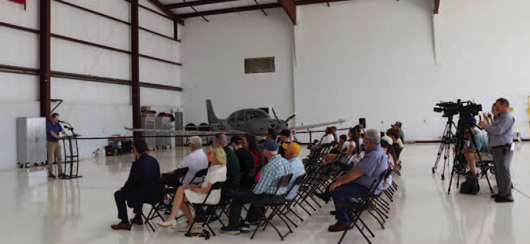Oklahoma Department of Aerospace and Aeronautics Executive Director Grayson Ardies speaks during the Guthrie Edmond Regional Airport Taxiway Realignment Project ribbon cutting ceremony June 30 inside Hangar No. 2. Photo courtesy of the City of Guthrie.