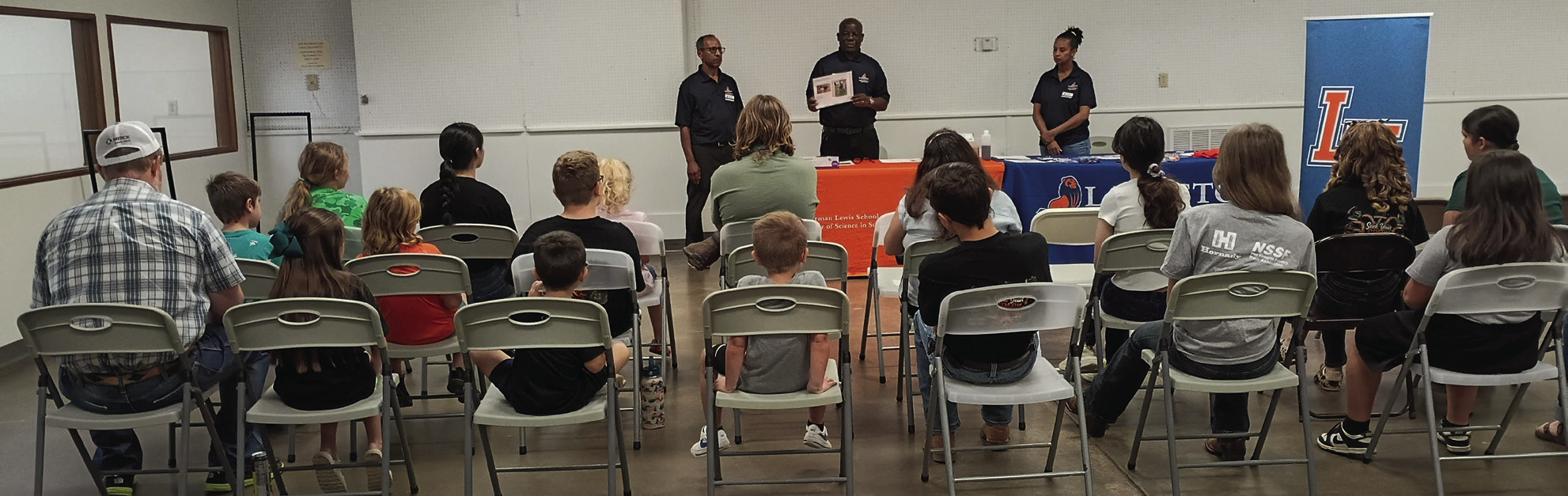 Logan County 4-H members listen as faculty from Langston University's Sherman Lewis School of Agriculture &amp; Applied Sciences discuss dairy goat breeds and the nutritional value of goat milk during the second Dairy Education Day on July 11.