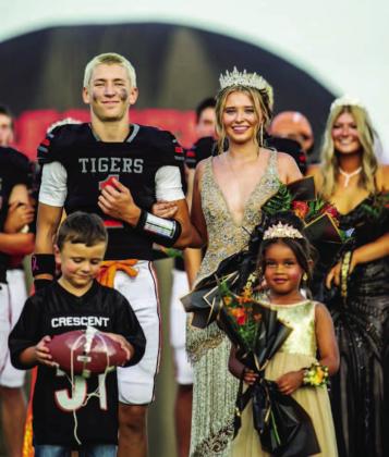 Gracie Ruggs, escorted by Smith Gordon, Flower Girl Harlym Perkins, and Crown Bearer Leo Heskett was crowned Crescent’s Homecoming Queen on Friday night.