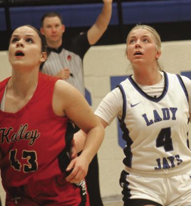 Guthrie's Kinley Duehning eyes a rebound against Bishop Kelley, Dec. 20, 2024. Photo by George McCormick.