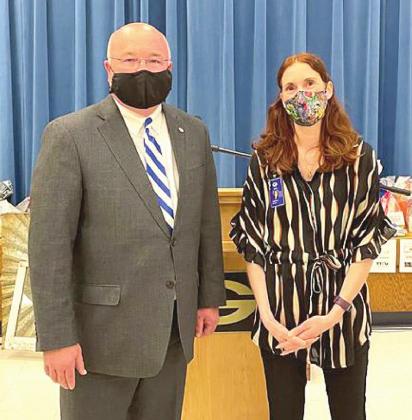 Superintendent Dr. Mike Simpson (left) and Cotteral Elementary Librarian Kat Jensen (right) after Jenson was named Teacher of the Year.