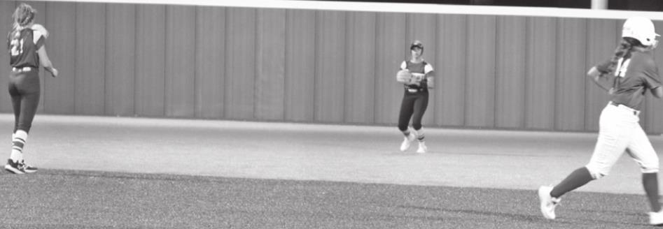 Haley Gallo with the catch, Saige Driscoll at shortstop and McKenna Tucker at second base with the Piedmont runner