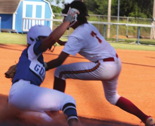 Guthrie´s Haley Gallo slides safely into third base against Putnam City North