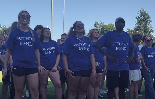 Front Row - Guthrie Marching Band Drum Majors.