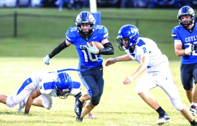 Coyle’s Carsen Hock finds an opening on his way to one of his two touchdown runs in the Bluejackets’ 48-36 win over Depew on Friday.