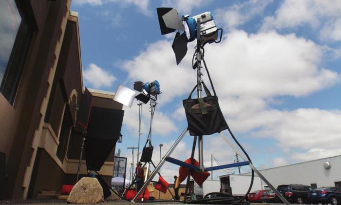 Movie equipment for filming ‘Black bags’ set up outside of Roma’s.