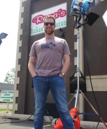 Josh Brandon stands outside of Roma’s Italian restaurant in Guthrie.