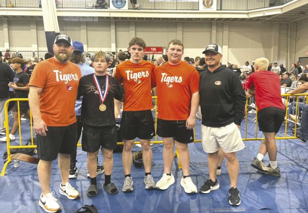 Pictured left to right are Coach Dalke, Houston Wilmoth, Evan Stanfill, Beaux Deason, and Coach Hixon. Photo courtesy of Crescent football facebook page.