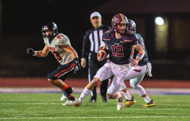 Ben Harman on the move against Pawhuska Photos courtesy of Brad Stone