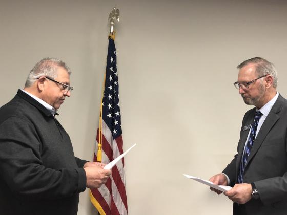 From right to left: Randy Kellogg administers the oath of office to Gary Johnson, who was recently elected to the Meridian Technology Center Board of Education. Johnson has served Meridian for several years as a member of the board. The Meridian district is divided into five geographic areas. Meridian’s board members live in and represent their district for a five-year term. Members are tasked with ensuring Meridian continues to fulfill its mission to educate, enrich lives and secure economic futures.