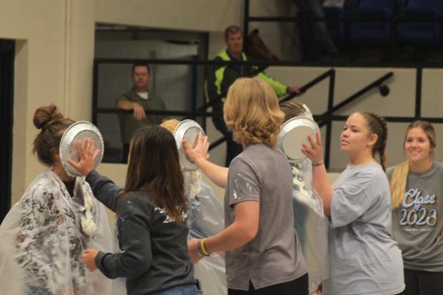 The sophomore class celebrates winning the fundraising competition by pieing the other classes' fundraisers