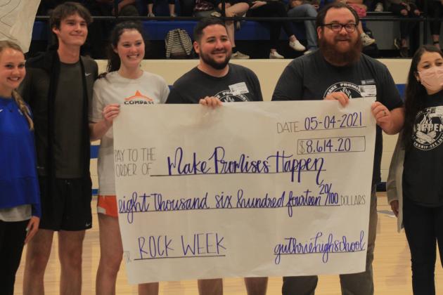 GHS students present a check to Make Promises Happen