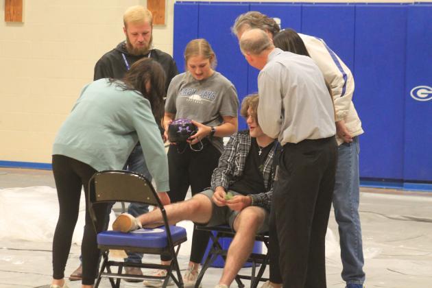 As promised, a GHS student has his legs waxed after GHS meets its fundraising goal