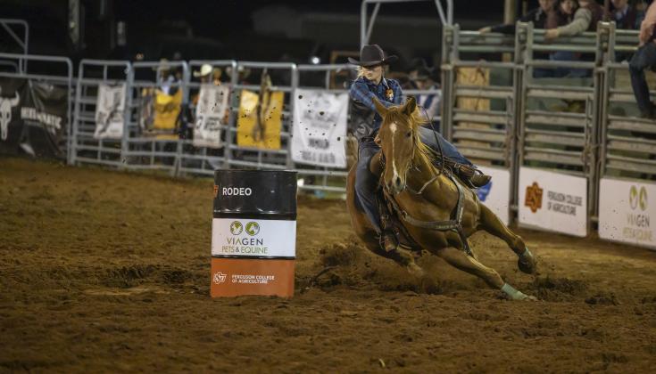 Kenna McNeill competes in the barrel racing event at the Cowboy Stampede Rodeo in Payne County in April. (Photo by Todd Johnson, OSU Agricultural Communications Services)