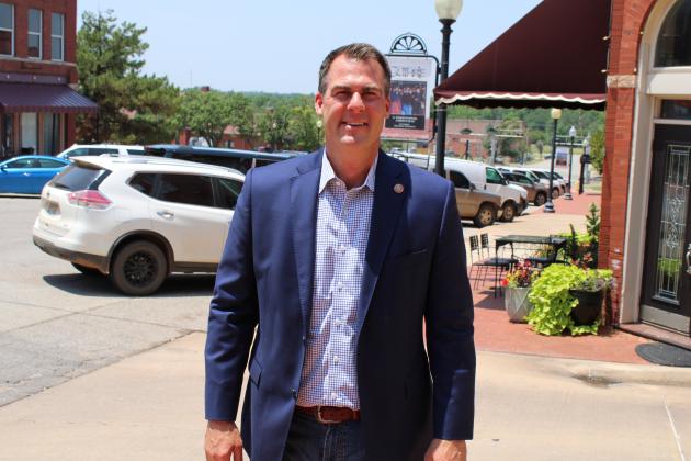 Oklahoma Governor Kevin Stitt on the sidewalk of Oklahoma Avenue. (Photo by Jacob Sturm)