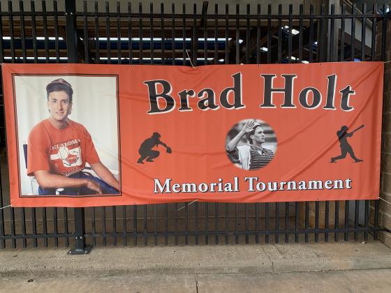 Brad Holt pictured on a banner outside Squires Field in Guthrie