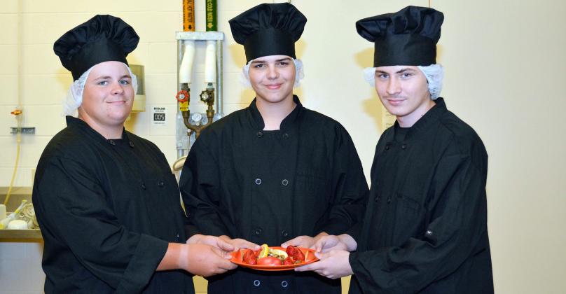 Oklahoma 4-H members, Levi Wagner (left), Stanton Hooper (middle) and Keaston Gonzalez (right), from Cotton County presenting their prepared dish before a panel of judges before being selected to represent the state at nationals.