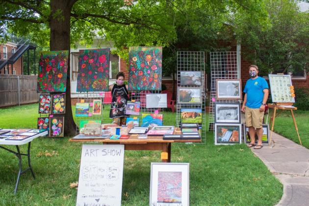 Madeline Dillner, photo of artist selling art in yard during OK Art Crawl 2020