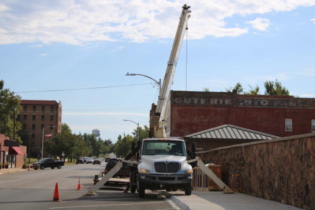Scoreboard being removed by crane outside of Jelsma