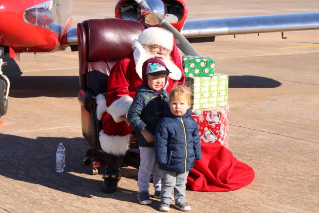 Santa with kids for photo.