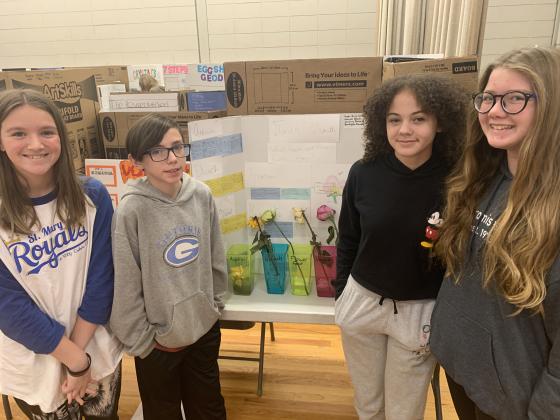 From Left to Right: Peyton Watson, Zach Barnett, Brooklyn Mendez and Kennedi Wheeler standing next to the first place project.