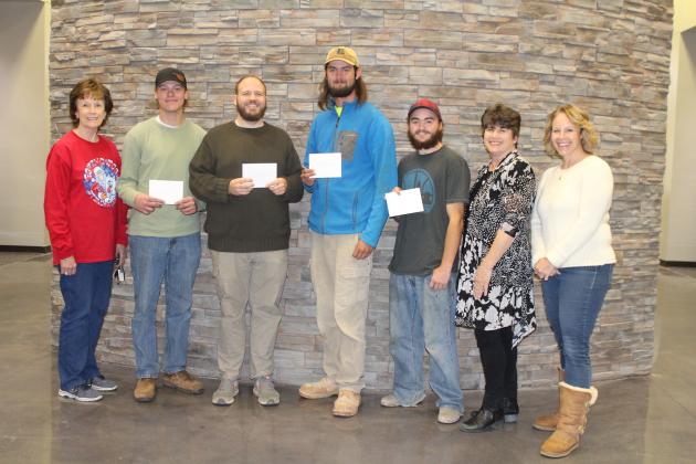 The Stillwater Board of REALTORS presented $500 scholarships to several of Meridian’s Construction Trades students to assist as they pursue careers in the industry. From left to right are SBOR past president Donna Rhinehart; students include Michael Lauvetz in the Air Conditioning and Refrigeration program, Haniel Goertz in the Electrical Technology program, Cantrell Haley in the Masonry program, and Levi Miracle in the Carpentry program; SBOR president Page Provence and SBOR secretary Shannon Cowan.