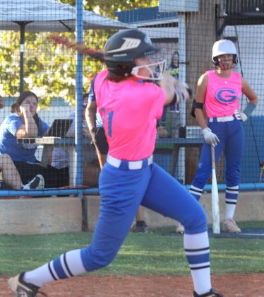 Katelynn Seiss gets base hit as Haley Gallo looks on.