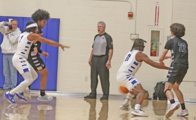 Guthrie seniors Brayden Morgan and Tyronne Beatty were named to the 5A-1 first team in coaches voting last week. Guthrie did not land any players on the player of the year awards despite an outstanding 22-5 season. Senior Nathan Bedford was named to the second team and Senior Alex Clark was named to the third team. Senior Jaylen Harper and freshman Kolson Smedley were named honorable mention. Benford and Beatty were named to the All-Defensive team as well. Photos by Mike Monahan