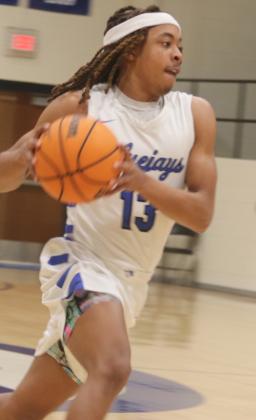 Braydon Morgan on fastbreak to the basket.