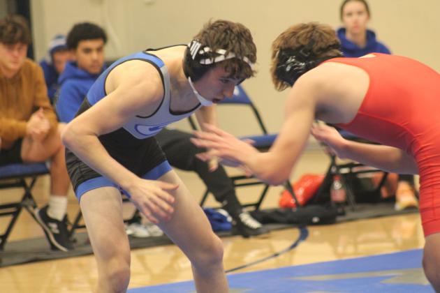 Guthrie's Thomas Jirous wrestles Comanche's Kasyn Doss during Friday's dual at GHS. Thursday, Dec. 12