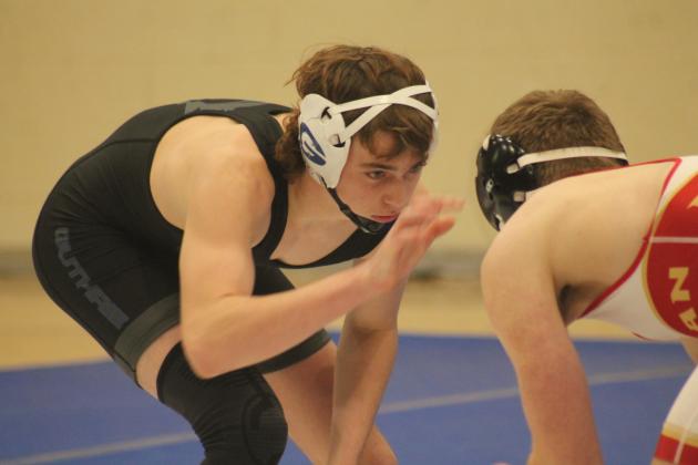 Guthrie's Aiden Hardin wrestles Duncan's Deacon Clark on Thursday, Jan. 16. Taken by George McCormick.