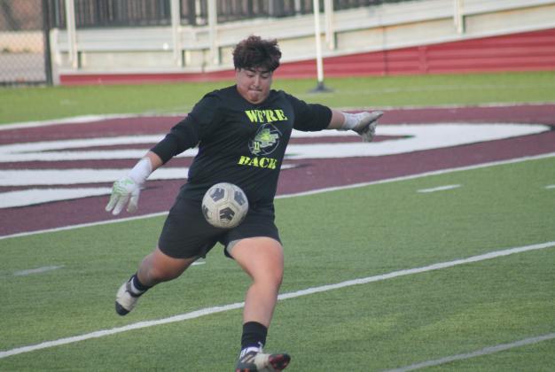 Guthrie goalkeeper Jesus Torres boots away a kick against Edmond Memorial, Wednesday, March 12. Taken by George McCormick.