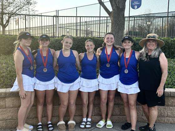L-R Haven Hudson and Hollie Mitchell placed 5th at 2 doubles, Kenzie Hardesty placed 6th at 2 singles, Lola Brown placed 6th at 1 singles, Rylee Tobin and Aspen Mitchell placed 2nd at 1 doubles, Coach Mary Hudson during the Duncan West tournament. Submitted photo