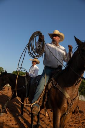 Bobby Kane works from horseback in the arena during the Guthrie Youth Rodeo on Saturday at the Logan County Fairgrounds