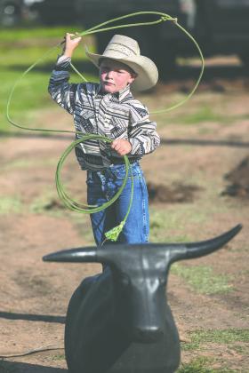 Colt Patton of McAlester competes in the dummy roping event during the Guthrie Youth Rodeo on Saturday at the Logan County Fairgrounds.