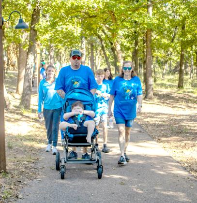 Tucker’s Warriors are all smiles during this year’s Walk to End Hydrocephalus.