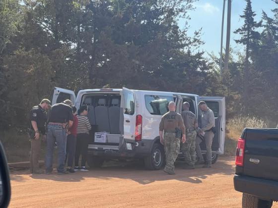Individuals being detained at grow on Midwest and Industrial in Guthrie.