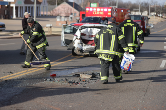 Guthrie Fire cleans up debris after an accident on Sunday.