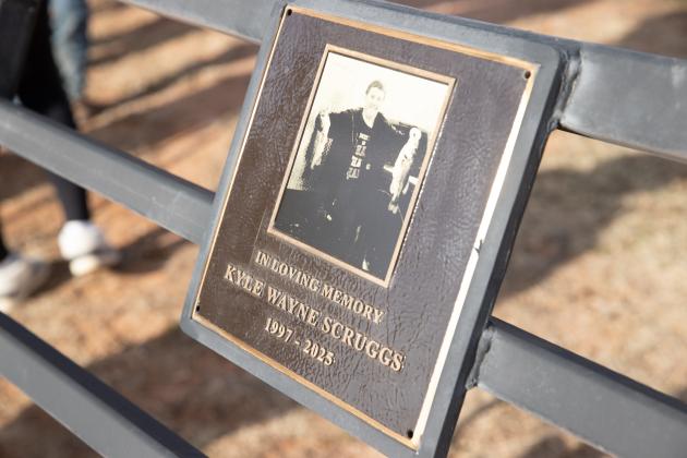 Plaque placed on the bench at Liberty Lake in Guthrie