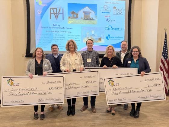 CASA for Kids in Logan County accepting a donation from the Central Oklahoma Home Builders Foundation from the sale of the 2026 House of Hope. Photo submitted