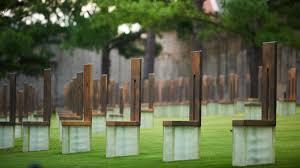 The Field of Empty Chairs with the Reflecting Pool and Memorial Museum.  Photo courtesy OKC National Memorial Museum