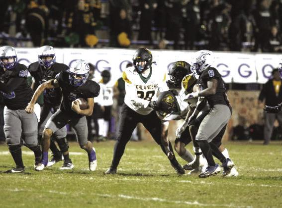 Guthrie's Kolten Carlock breaks away against Lawton MacArthur in the first round of the 2024 Class 5A state playoffs.