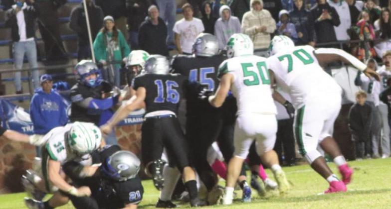 Guthrie defense stops the extra point
