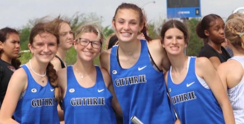 Guthrie 4 x 800 meter relay team of Peyton read. Kamryn Boller, Raley Hooper and Hannah Smith before the race