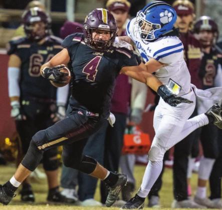 Nick Nabavi runs away from Hooker defense Photo by Brad Stone