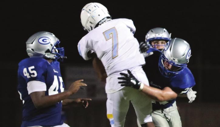 Guthrie defense hits the PCW quarterback who actually completed this pass on a Hail Mary