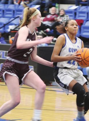 Aubrey Taylor drives to the bucket.