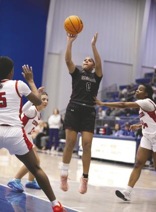 Cashion’s Lily Stuemky (20) attempts a shot againstChristian Heritage Academyduring the Class 2A girls state championship game Saturday at Bridge Creek High School in Blanchard, Okla. Christian Heritage defeated Cashion 60-36