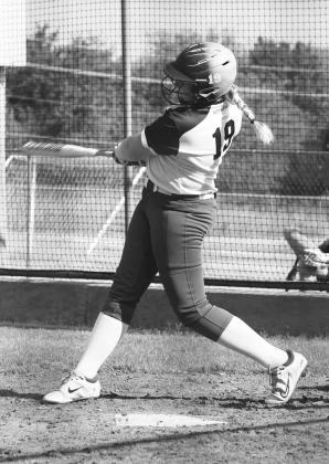 GJHS pitcher Emery Hebensterger in action against GJHS Anna Stevens takes a swing. Bethany.